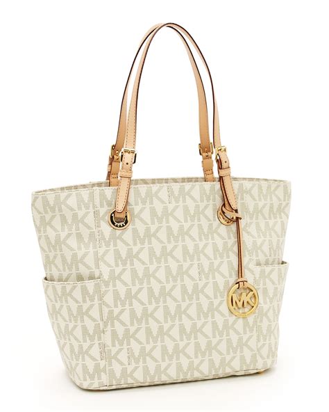 michael kors jet set logo multifunction tote vanilla|Michael Kors jet set pouch.